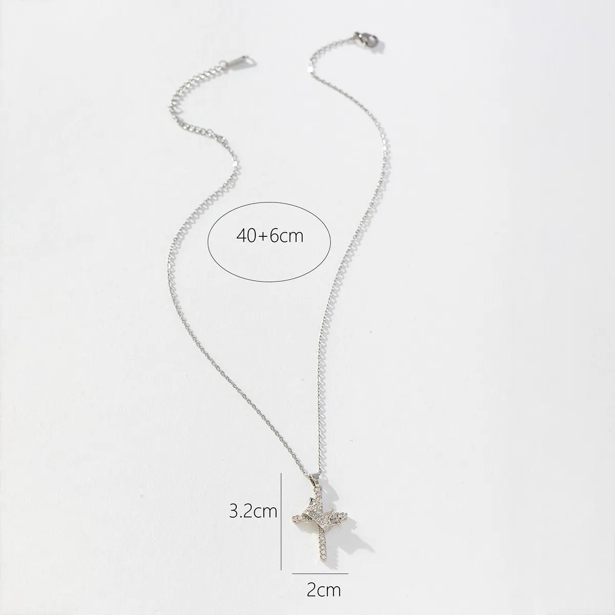 Collar Cruz con Corona y Circonitas · Plateado