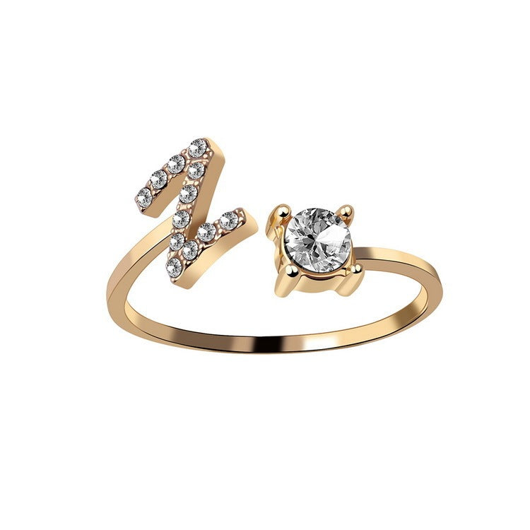 Anillo con Inicial Ajustable · Personal y Elegante