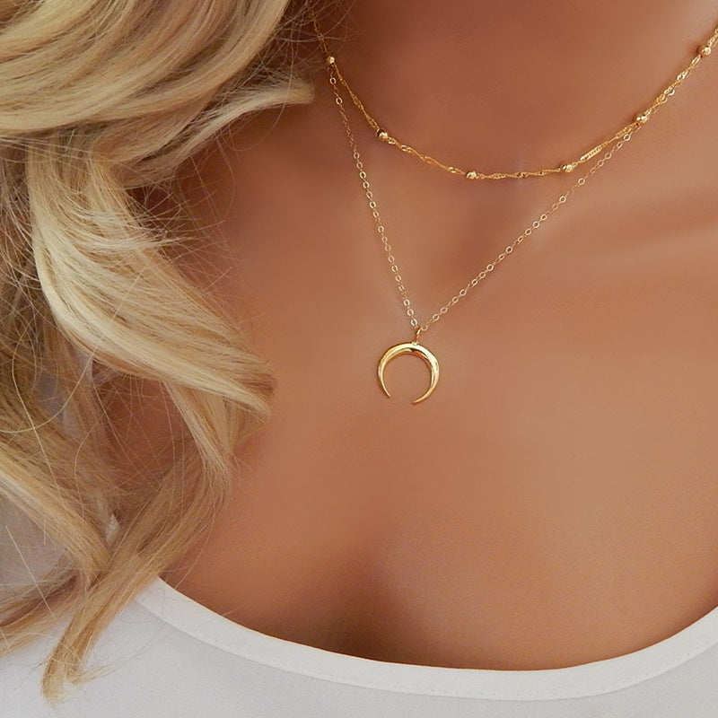 Collar Doble Media Luna · Dorado